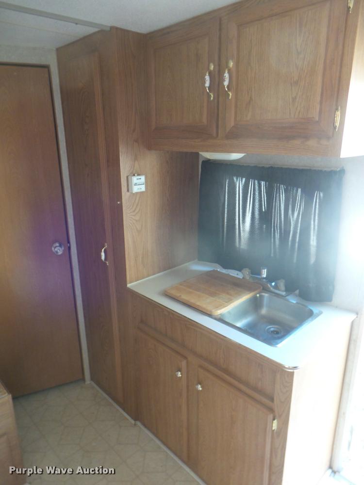 image for item L1721 1998 Prowler camper