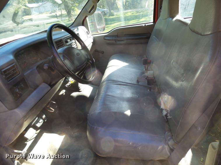 image for item L3274 1999 Ford F350 Super Duty Crew Cab flatbed pickup truck