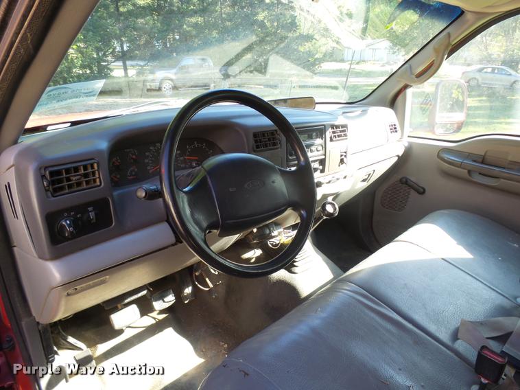 image for item L3274 1999 Ford F350 Super Duty Crew Cab flatbed pickup truck