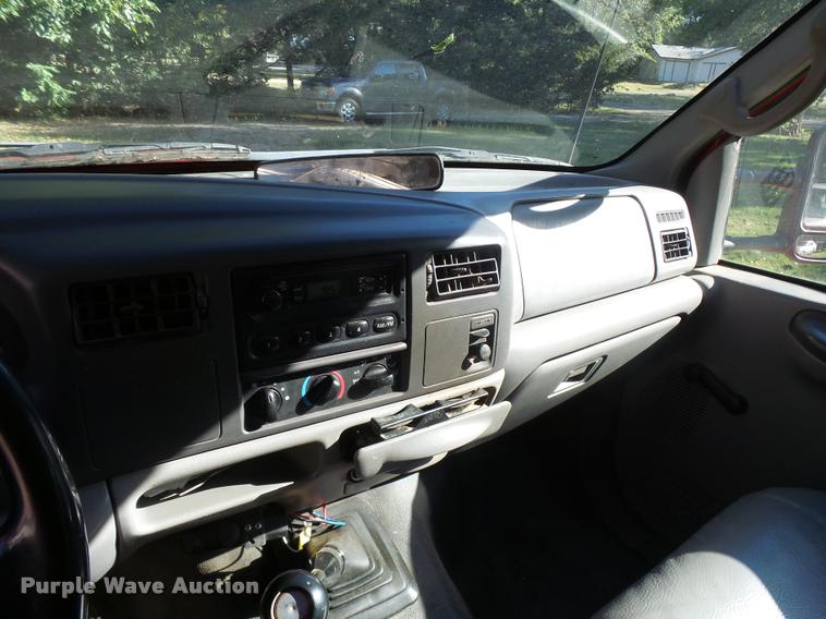 image for item L3274 1999 Ford F350 Super Duty Crew Cab flatbed pickup truck