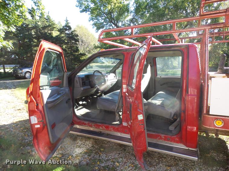 image for item L3274 1999 Ford F350 Super Duty Crew Cab flatbed pickup truck