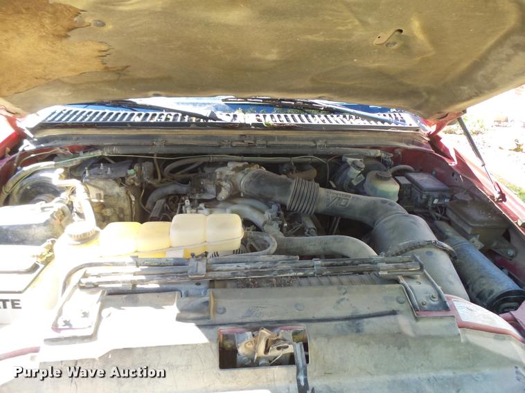 image for item L3274 1999 Ford F350 Super Duty Crew Cab flatbed pickup truck