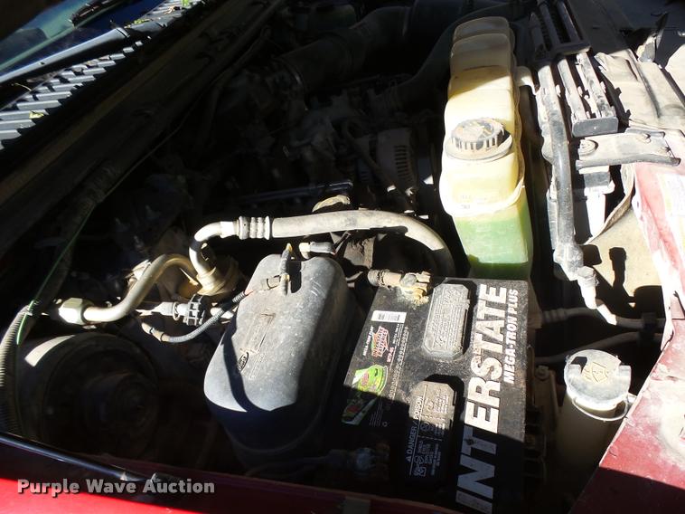 image for item L3274 1999 Ford F350 Super Duty Crew Cab flatbed pickup truck