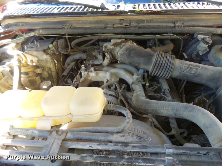 image for item L3274 1999 Ford F350 Super Duty Crew Cab flatbed pickup truck