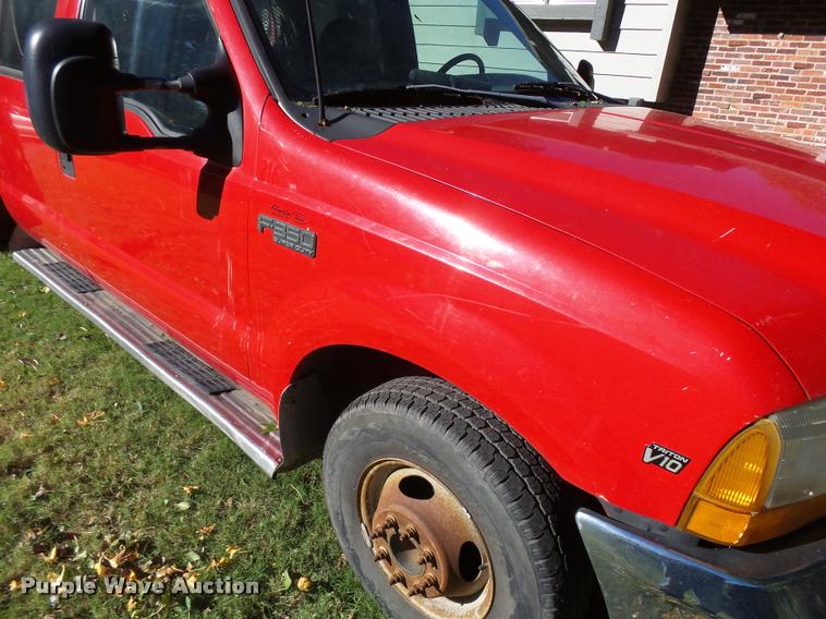 image for item L3274 1999 Ford F350 Super Duty Crew Cab flatbed pickup truck