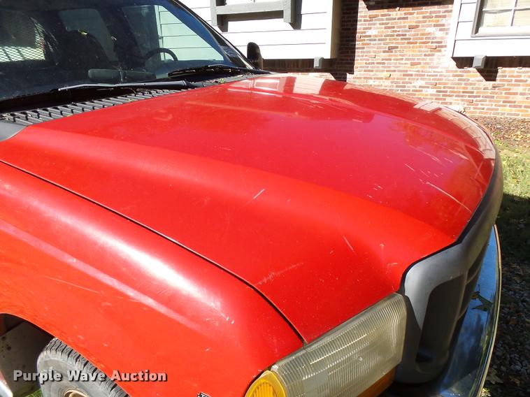 image for item L3274 1999 Ford F350 Super Duty Crew Cab flatbed pickup truck