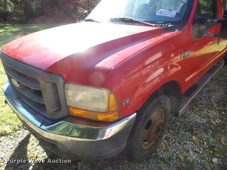 image for item L3274 1999 Ford F350 Super Duty Crew Cab flatbed pickup truck