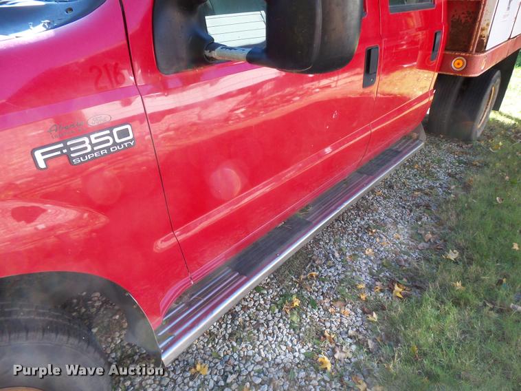 image for item L3274 1999 Ford F350 Super Duty Crew Cab flatbed pickup truck