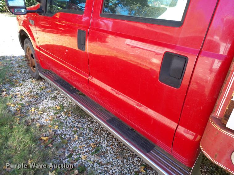 image for item L3274 1999 Ford F350 Super Duty Crew Cab flatbed pickup truck