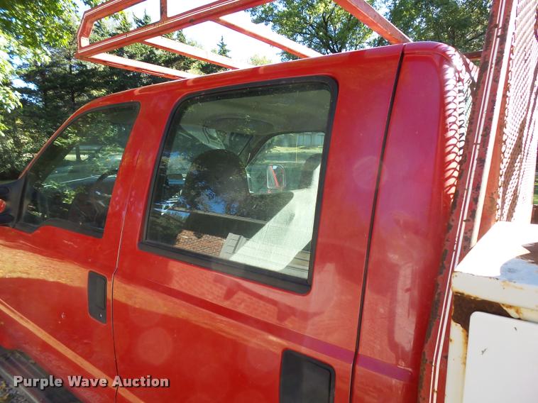 image for item L3274 1999 Ford F350 Super Duty Crew Cab flatbed pickup truck