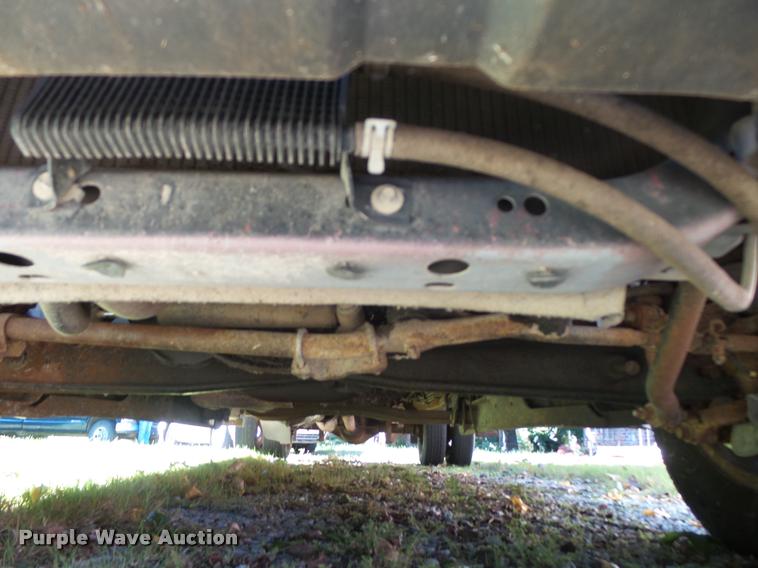 image for item L3274 1999 Ford F350 Super Duty Crew Cab flatbed pickup truck