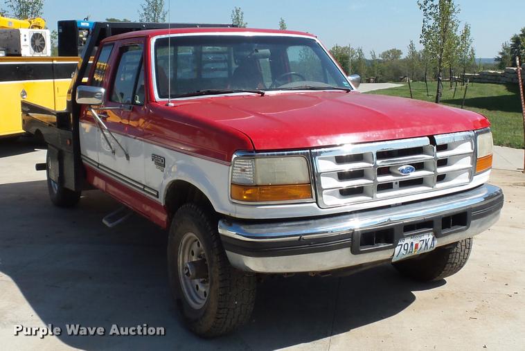image for item L4250 1996 Ford F250 SuperCab flatbed pickup truck