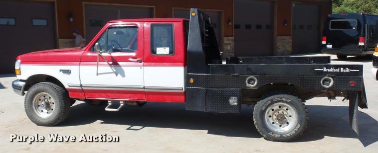 image for item L4250 1996 Ford F250 SuperCab flatbed pickup truck