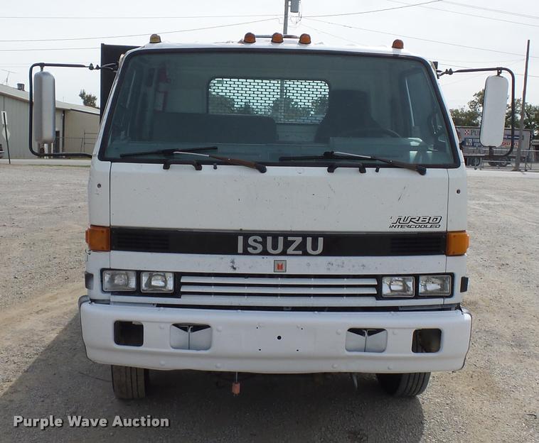 image for item L4381 1994 Isuzu NRR flatbed truck