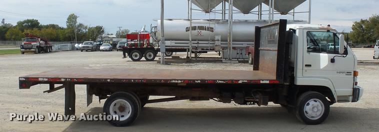 image for item L4381 1994 Isuzu NRR flatbed truck