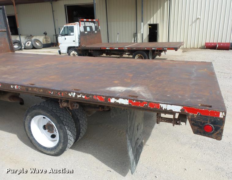 image for item L4381 1994 Isuzu NRR flatbed truck