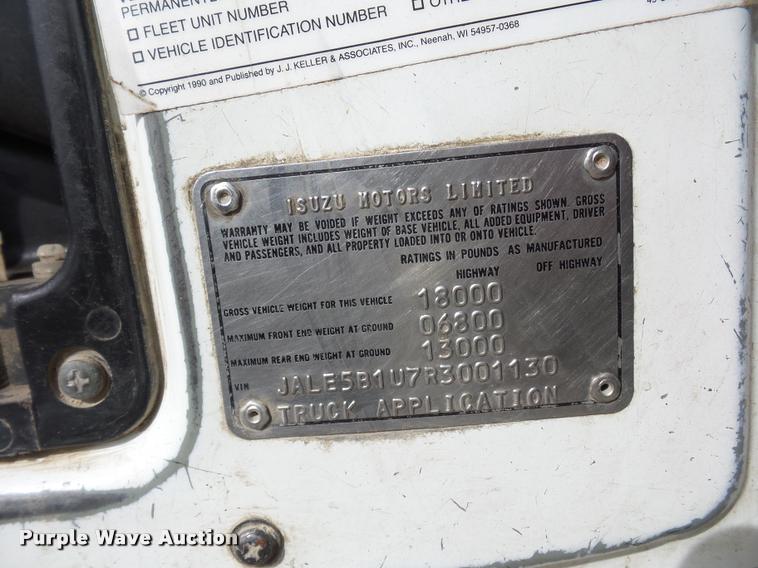 image for item L4381 1994 Isuzu NRR flatbed truck