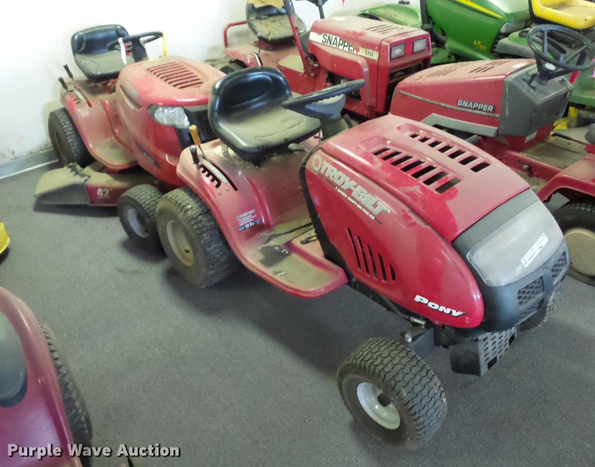 (2) TroyBilt lawn mowers in Desoto, MO Item AX9115 sold Purple Wave