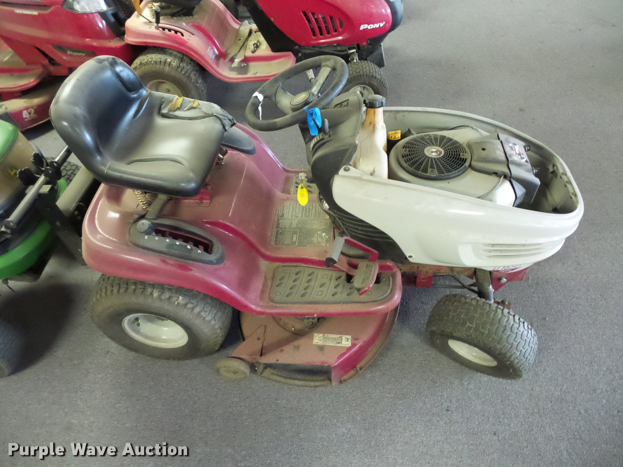 (2) lawn mowers in Desoto, MO Item AX9116 sold Purple Wave