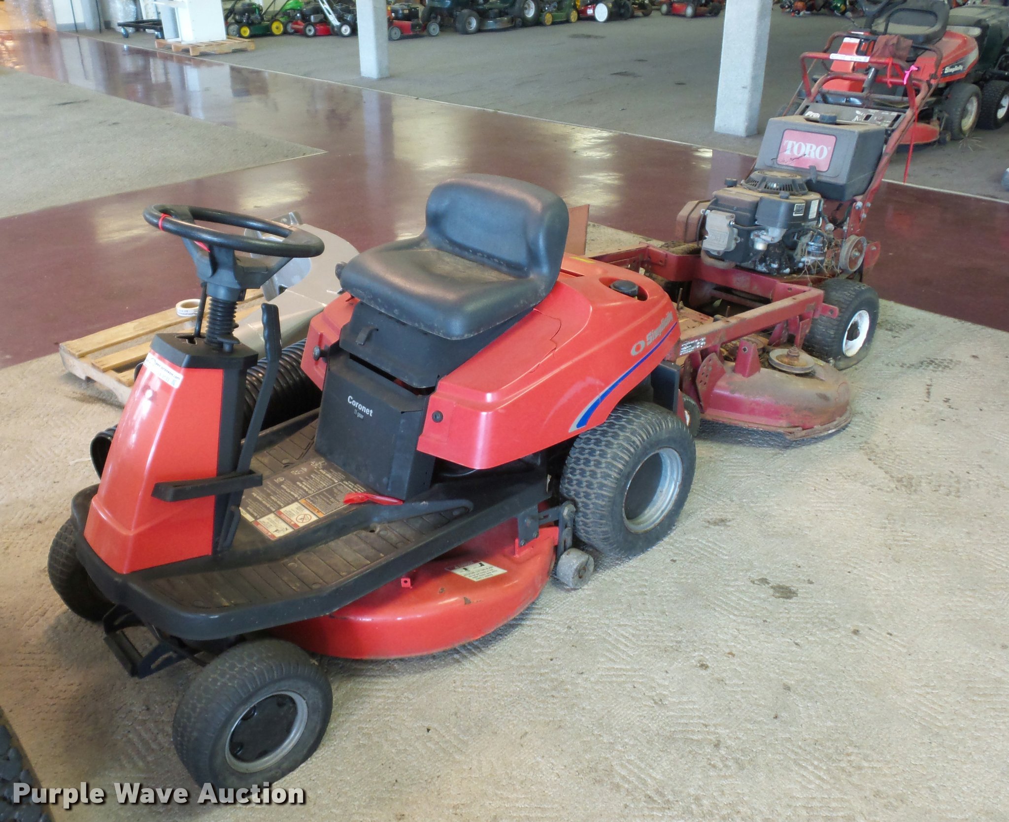 (2) lawn mowers in Desoto, MO Item AX9133 sold Purple Wave