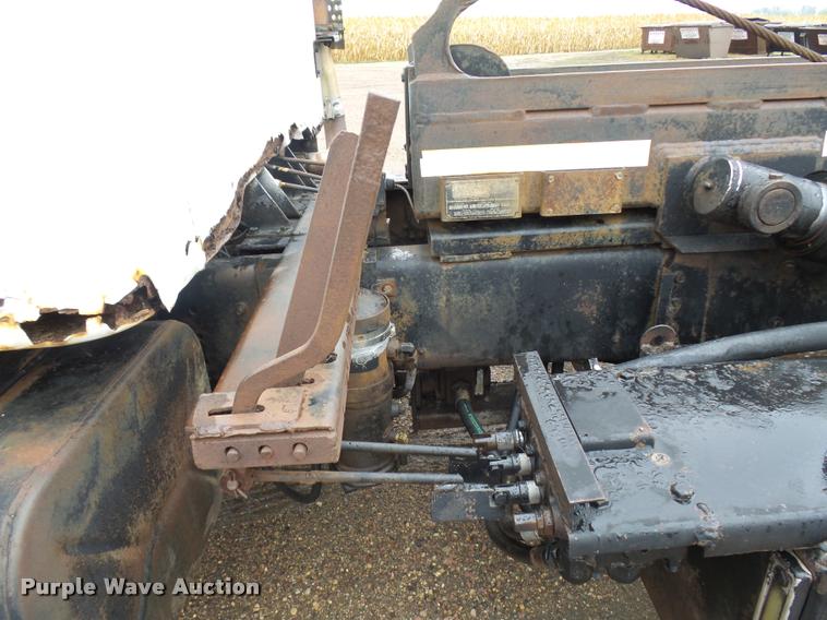 image for item J1631 1984 International F2574 roll off truck