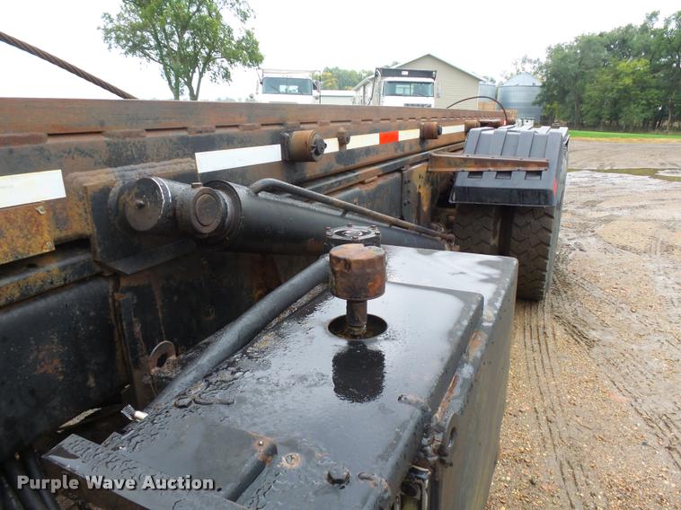 image for item J1631 1984 International F2574 roll off truck