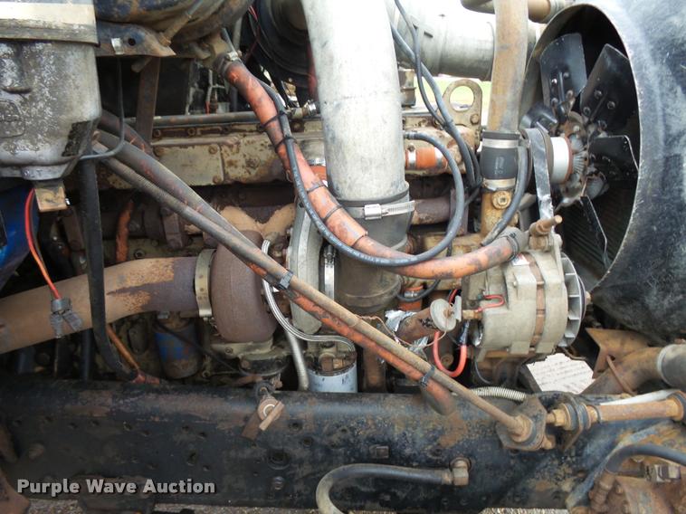 image for item J1631 1984 International F2574 roll off truck