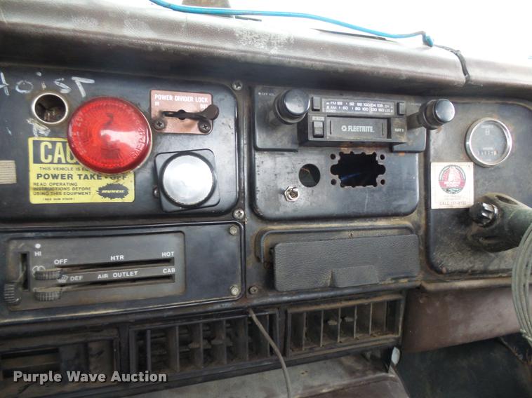 image for item J1631 1984 International F2574 roll off truck