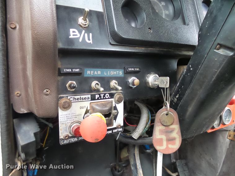 image for item J1631 1984 International F2574 roll off truck