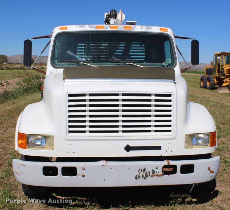 image for item K1916 1994 International 4700LP flatbed truck with environmental drill