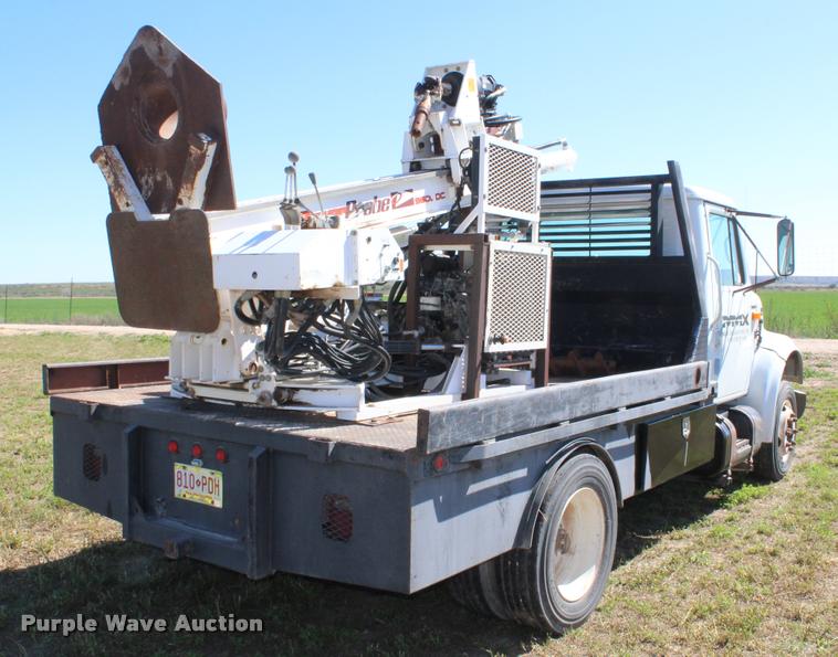 image for item K1916 1994 International 4700LP flatbed truck with environmental drill