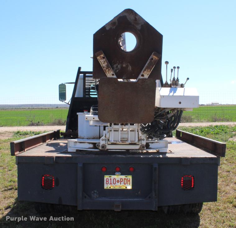 image for item K1916 1994 International 4700LP flatbed truck with environmental drill