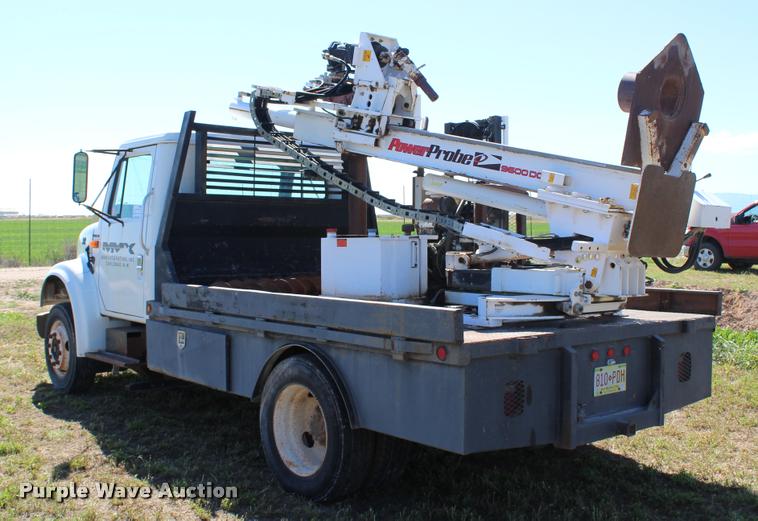 image for item K1916 1994 International 4700LP flatbed truck with environmental drill
