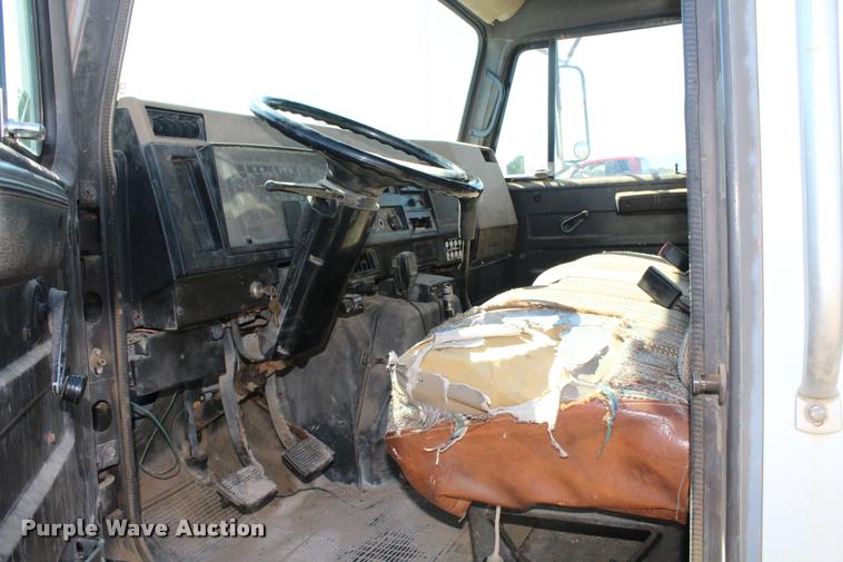 image for item K1916 1994 International 4700LP flatbed truck with environmental drill