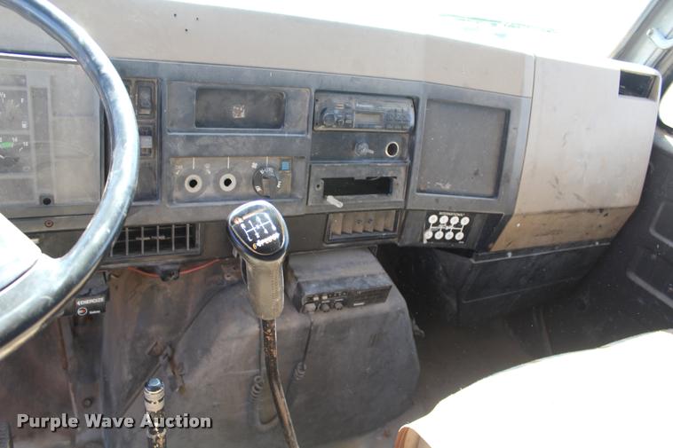 image for item K1916 1994 International 4700LP flatbed truck with environmental drill