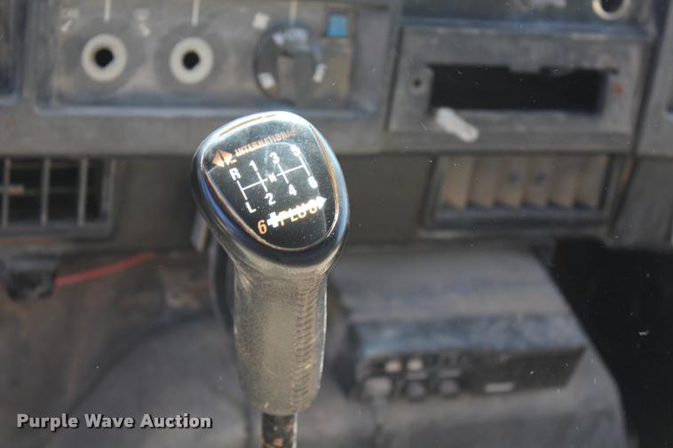 image for item K1916 1994 International 4700LP flatbed truck with environmental drill