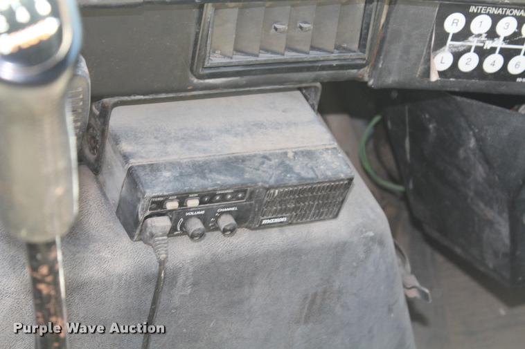 image for item K1916 1994 International 4700LP flatbed truck with environmental drill