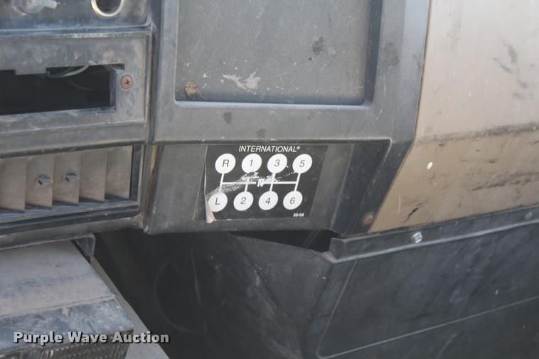 image for item K1916 1994 International 4700LP flatbed truck with environmental drill