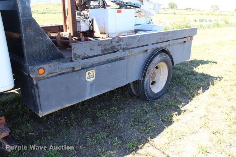 image for item K1916 1994 International 4700LP flatbed truck with environmental drill