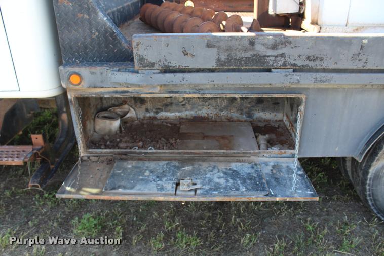 image for item K1916 1994 International 4700LP flatbed truck with environmental drill