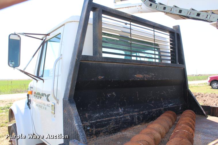 image for item K1916 1994 International 4700LP flatbed truck with environmental drill