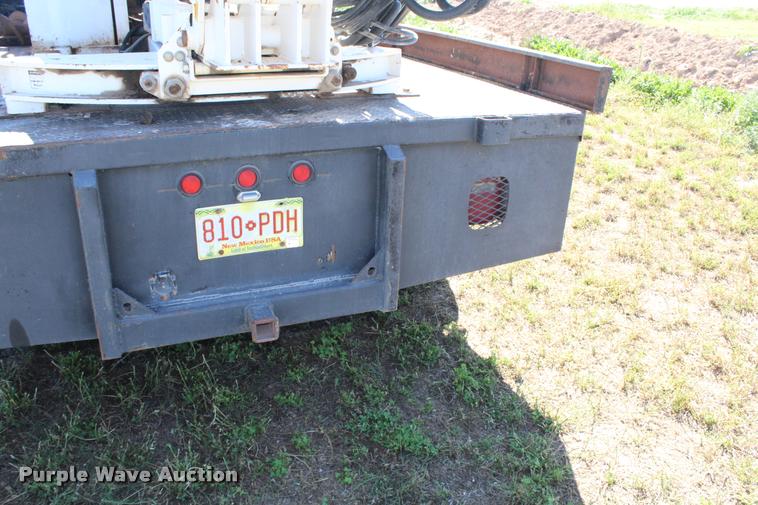 image for item K1916 1994 International 4700LP flatbed truck with environmental drill