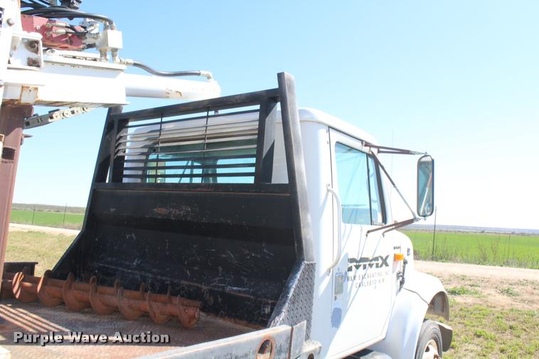 image for item K1916 1994 International 4700LP flatbed truck with environmental drill