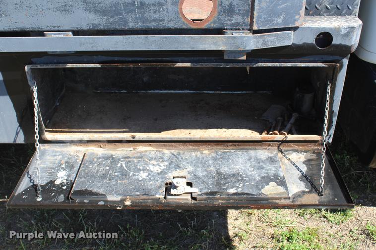 image for item K1916 1994 International 4700LP flatbed truck with environmental drill