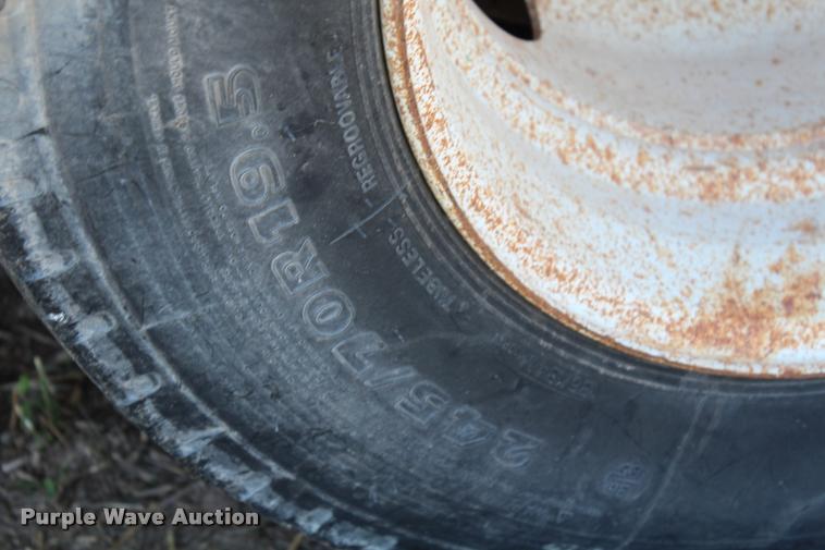 image for item K1916 1994 International 4700LP flatbed truck with environmental drill