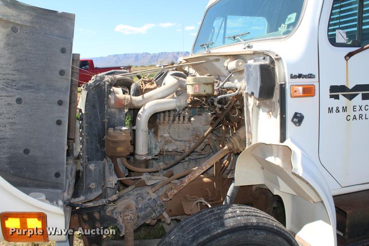 image for item K1916 1994 International 4700LP flatbed truck with environmental drill