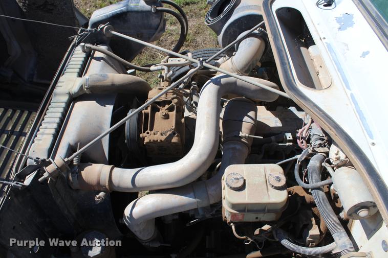 image for item K1916 1994 International 4700LP flatbed truck with environmental drill