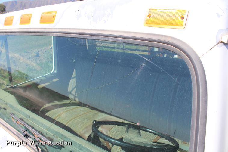 image for item K1916 1994 International 4700LP flatbed truck with environmental drill