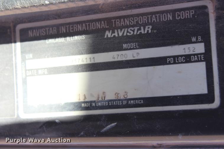 image for item K1916 1994 International 4700LP flatbed truck with environmental drill