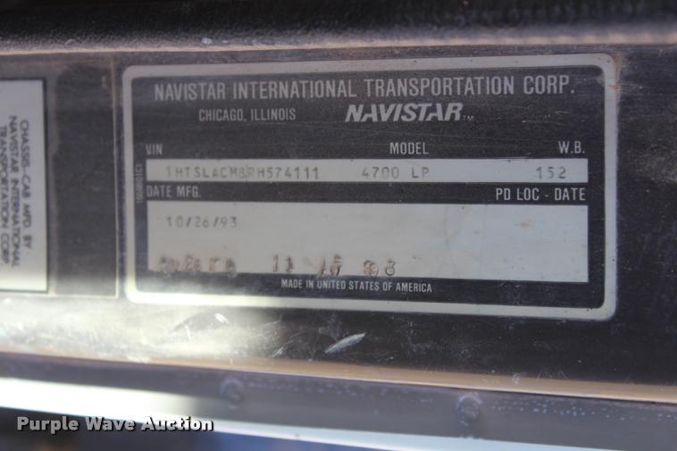 image for item K1916 1994 International 4700LP flatbed truck with environmental drill